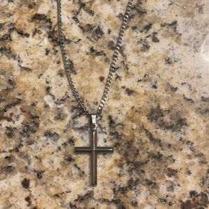 Silver, stainless steel cross pendent chain from Macy’s. Lobster clasp.